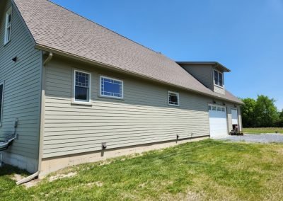 Professionally installed seamless aluminum gutters on a Vermont home — The Gutter Guys